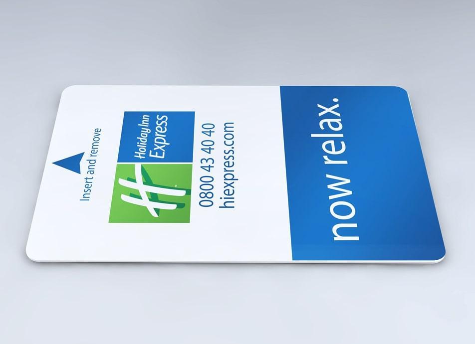 White and blue Holiday Inn Express hotel key card with white text and logo