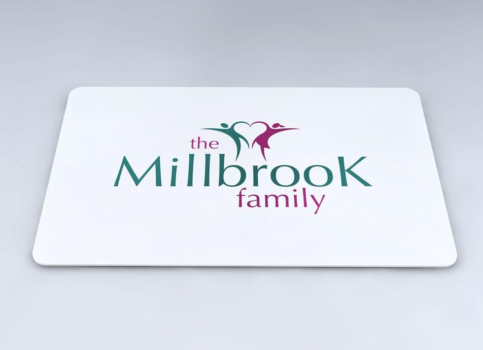White Millbrook Family loyalty Card with green and purple logo