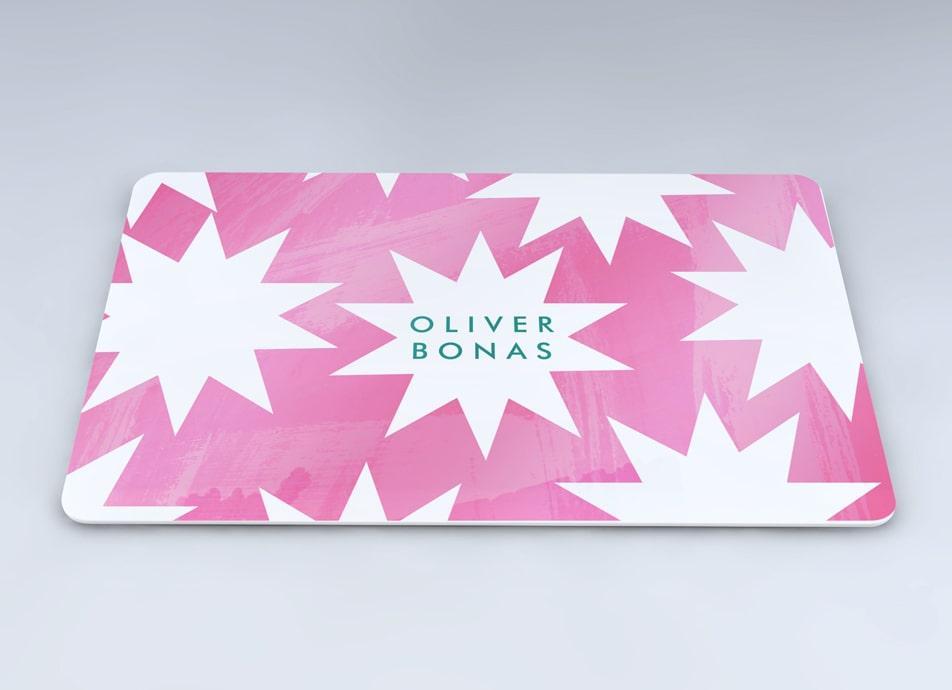 Pink and White Oliver Bonas Gift Card with Star pattern and logo