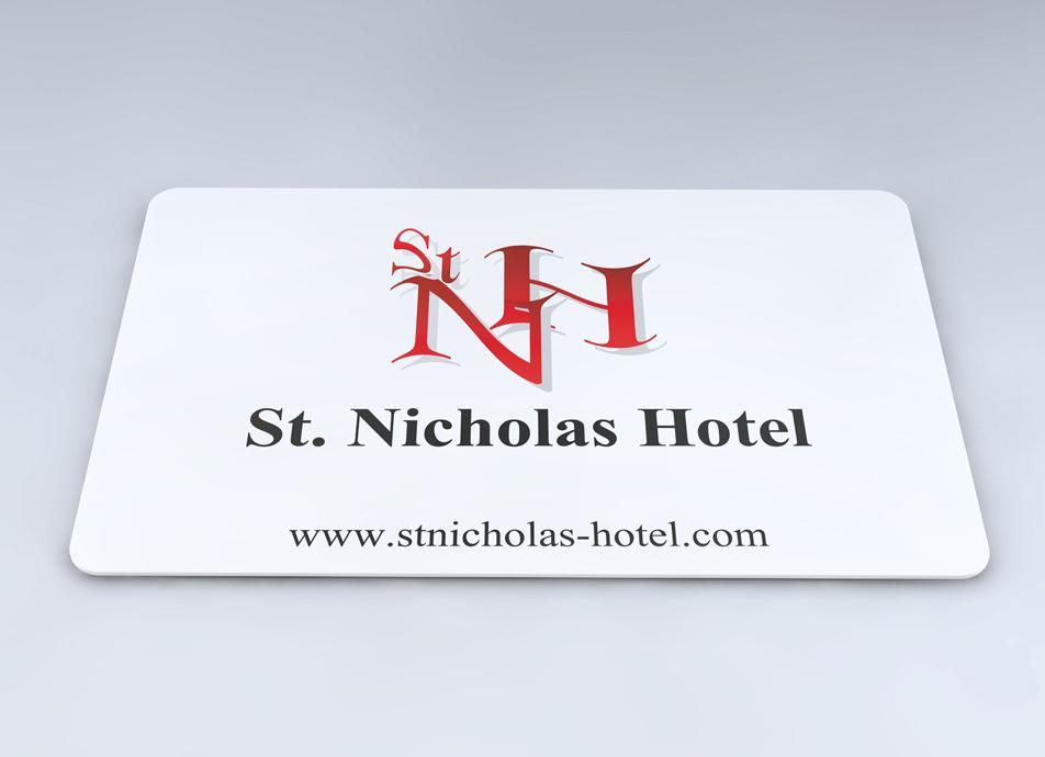 White St Nicholas hotel key card with black and red logo