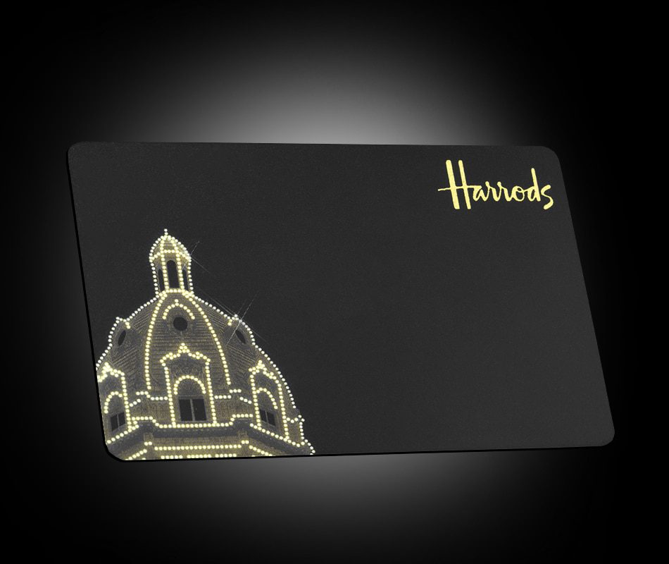 Black Harrods Gift Card with gold logo and illustration of building